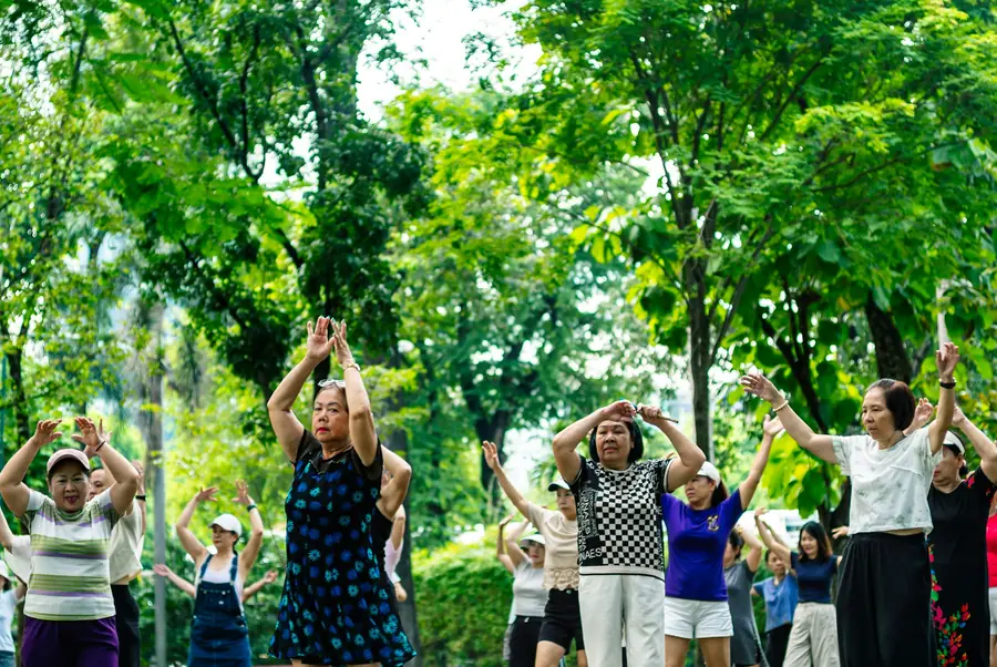 PLACEHOLDER stock photo of older adults exercising outdoors; not Fifty+ Fitness clients